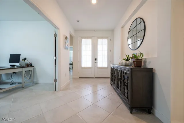 a view of room with furniture and windows