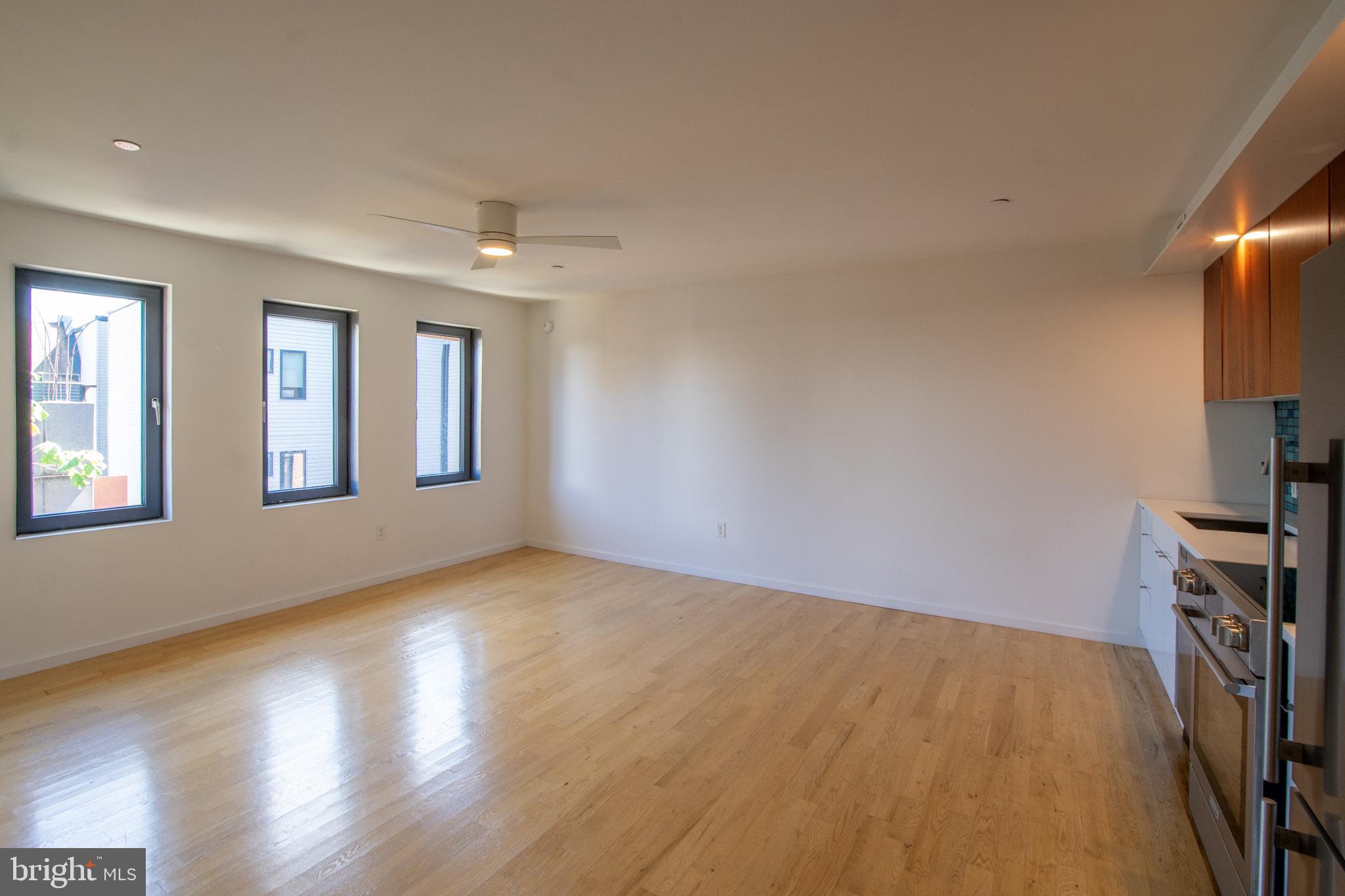 152 West Laurel Street, Unit 303 Philadelphia, PA 19123 - Photo 11 of 36 a view of livingroom with hardwood floor and hallway