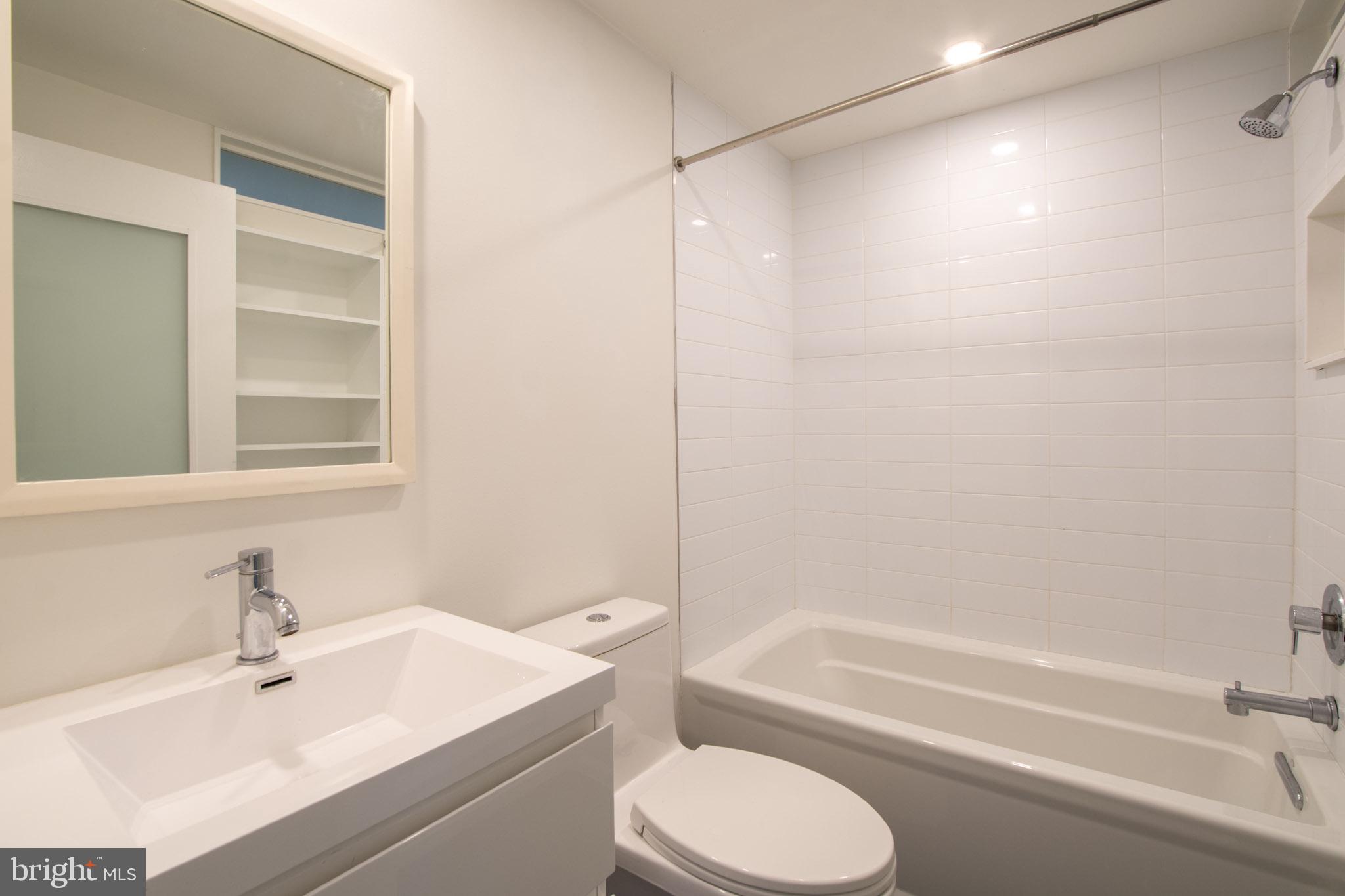 152 West Laurel Street, Unit 303 Philadelphia, PA 19123 - Photo 15 of 36 a bathroom with a sink toilet and shower