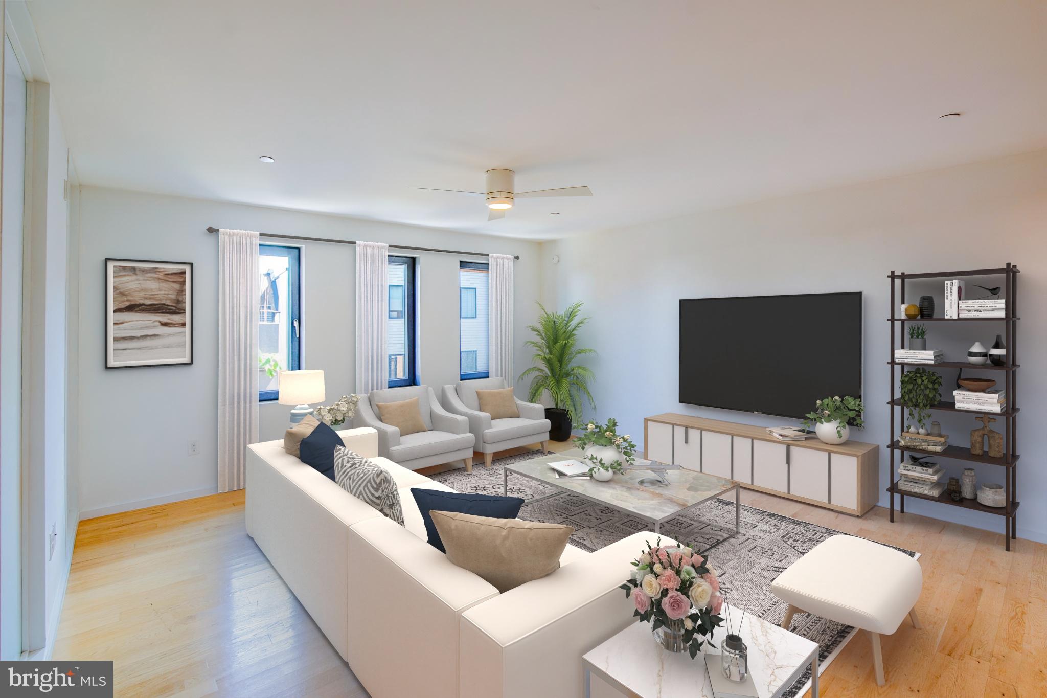 152 West Laurel Street, Unit 303 Philadelphia, PA 19123 - Photo 2 of 36 a living room with furniture and a flat screen tv