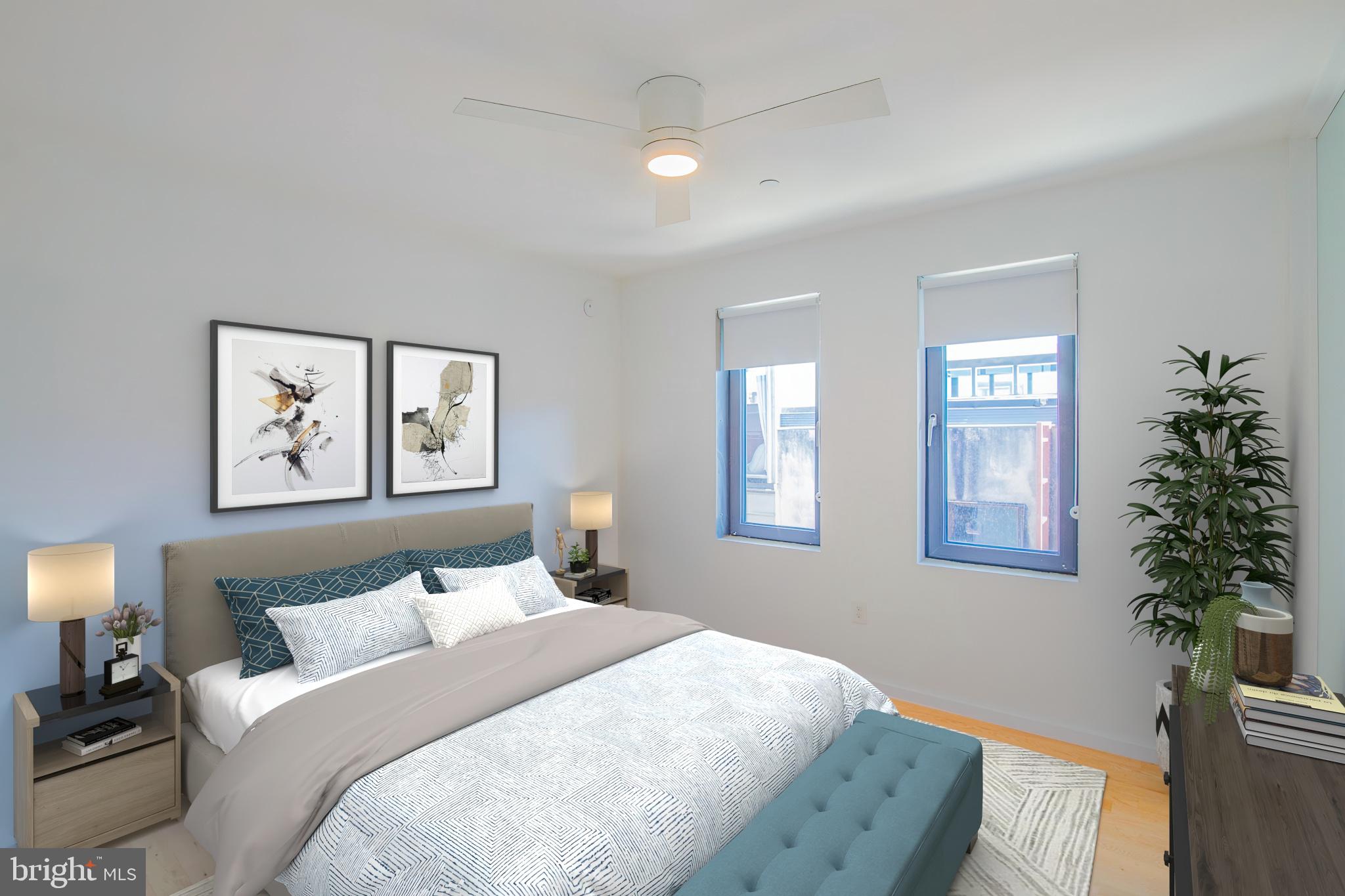 152 West Laurel Street, Unit 303 Philadelphia, PA 19123 - Photo 3 of 36 a bedroom with a bed and a window