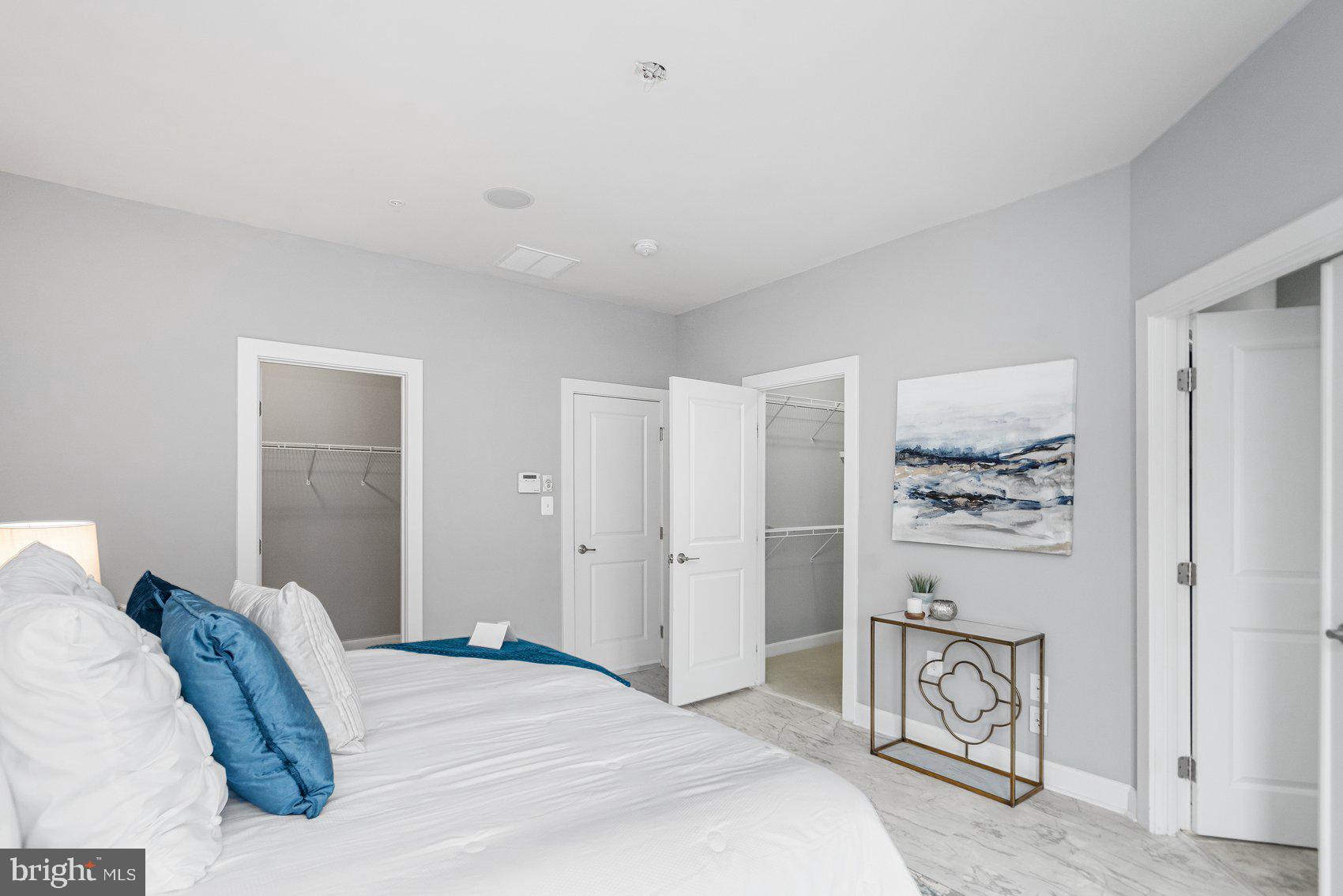 7429 Matapan Drive Hanover, MD 21076 - Photo 19 of 37 a bedroom with a bed and a window