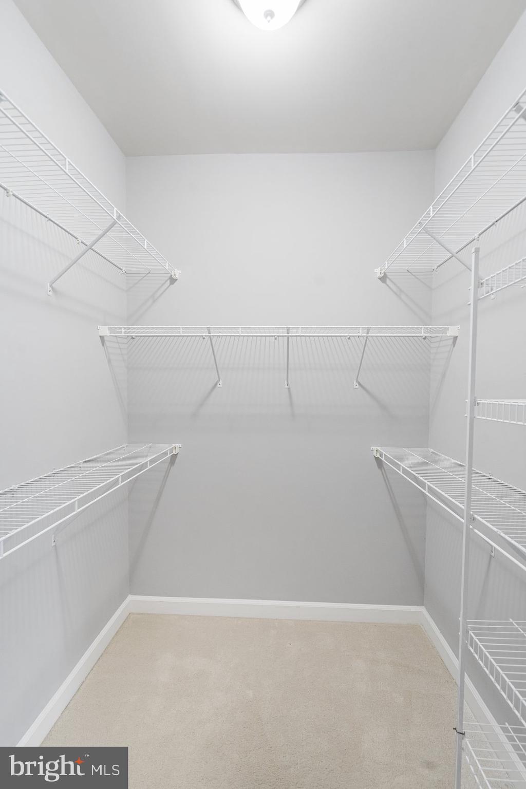 7429 Matapan Drive Hanover, MD 21076 - Photo 22 of 37 a view of a room with racks on the wall