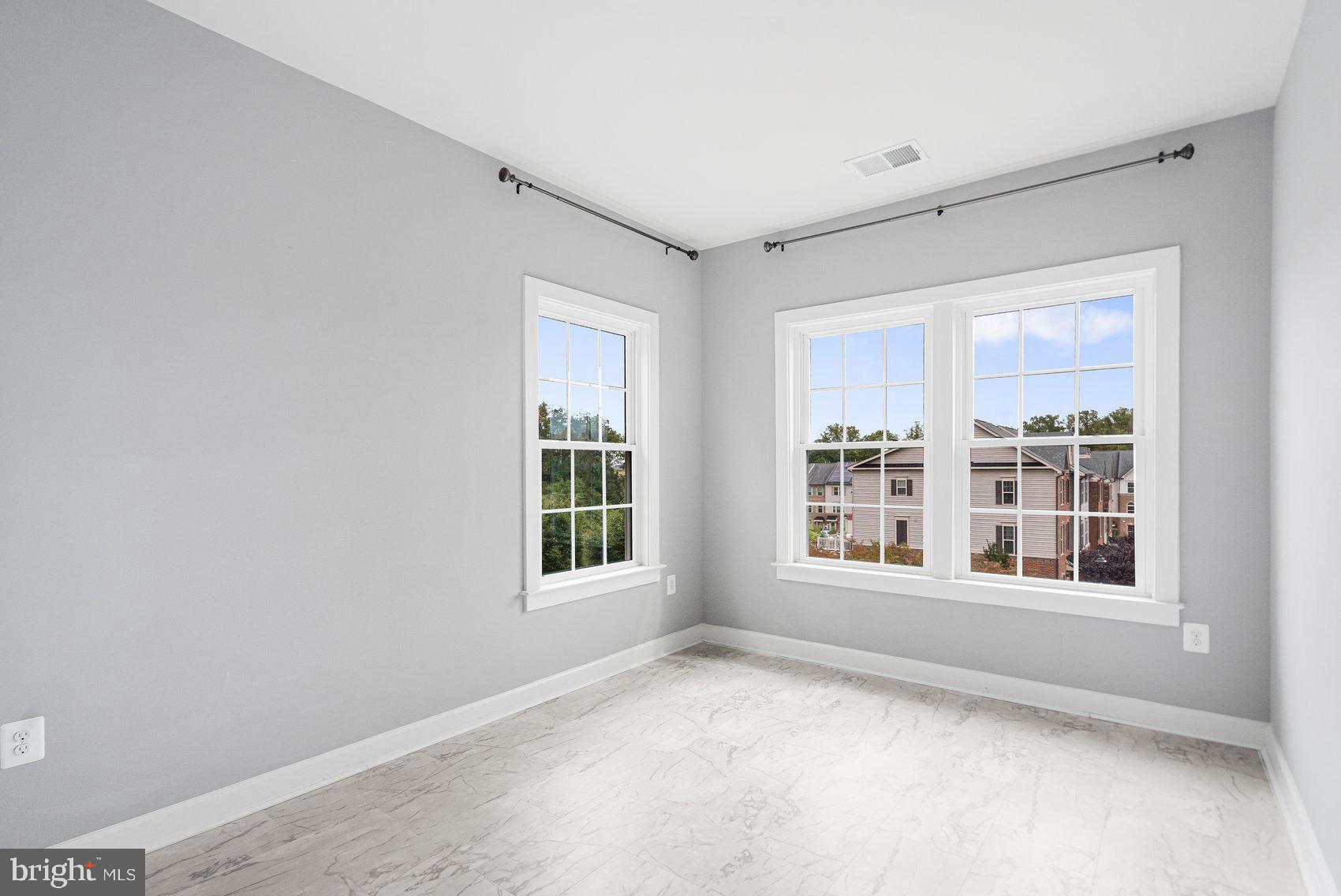 7429 Matapan Drive Hanover, MD 21076 - Photo 27 of 37 a view of an empty room with a window