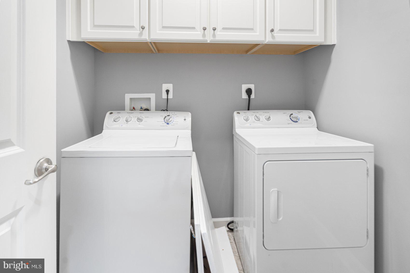 7429 Matapan Drive Hanover, MD 21076 - Photo 30 of 37 a utility room with dryer and washer