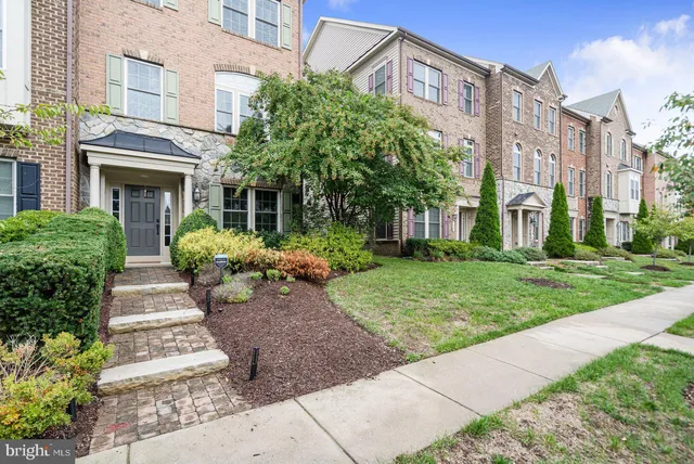 a view of a building with a garden
