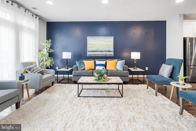 a living room with furniture and a couch