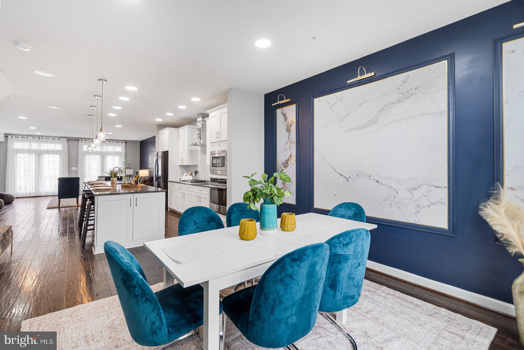 7429 Matapan Drive Hanover, MD 21076 - Photo 7 of 37 a view of a dining room with furniture and a potted plant