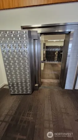 an empty room with wooden floor