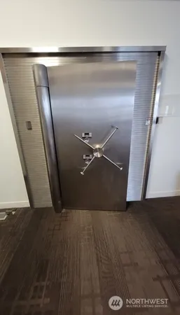 a view of entryway with a wooden door