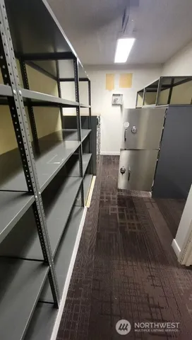 a living room with furniture window and potted plants