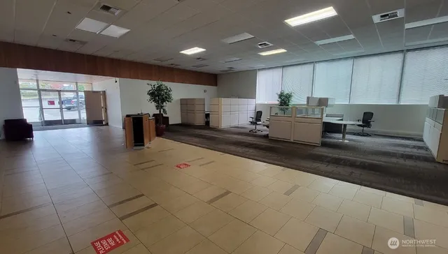 a view of a livingroom with furniture and cabinet