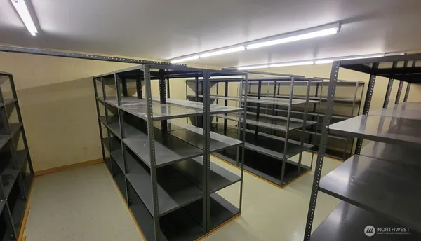 a workspace with furniture and window