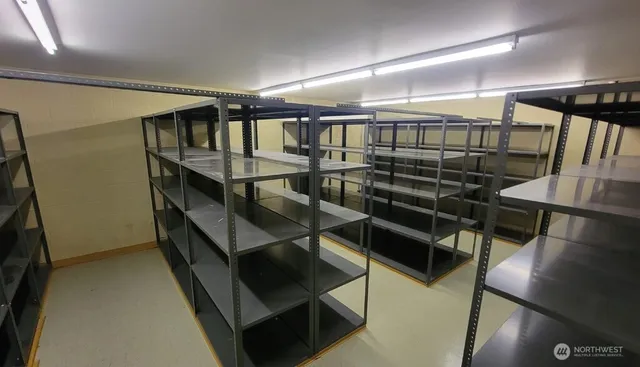 a workspace with furniture and window