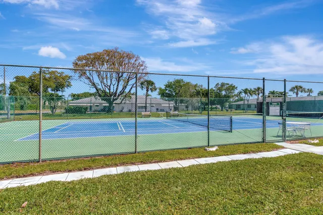 a view of swimming pool and a yard