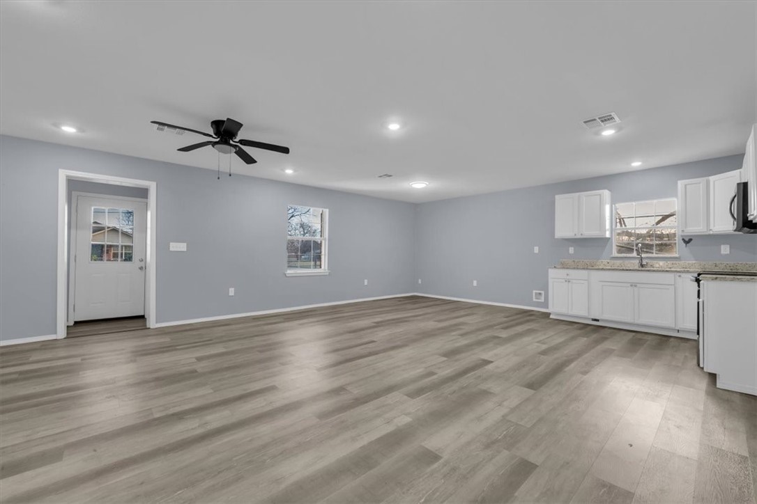 902 Calumet Avenue Waco, TX 76704 - Photo 15 of 27 a view of a kitchen with a sink and a window