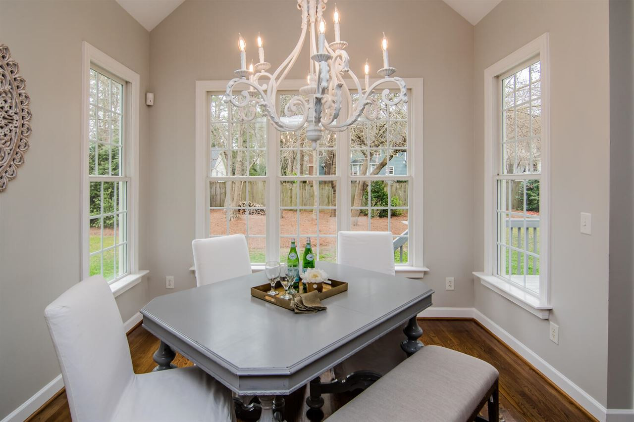 1614 Weatherford Circle Raleigh, NC 27604 - Photo 3 of 12 Overlooking the private yard, the breakfast area is the perfect place for relaxing with a cup of tea or coffee before starting your day! Breakfast Area
