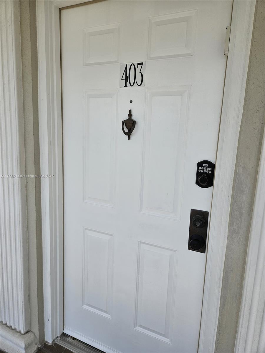 6085 Balboa Circle, Unit 403 Boca Raton, FL 33433 - Photo 26 of 32 a bathroom with a shower