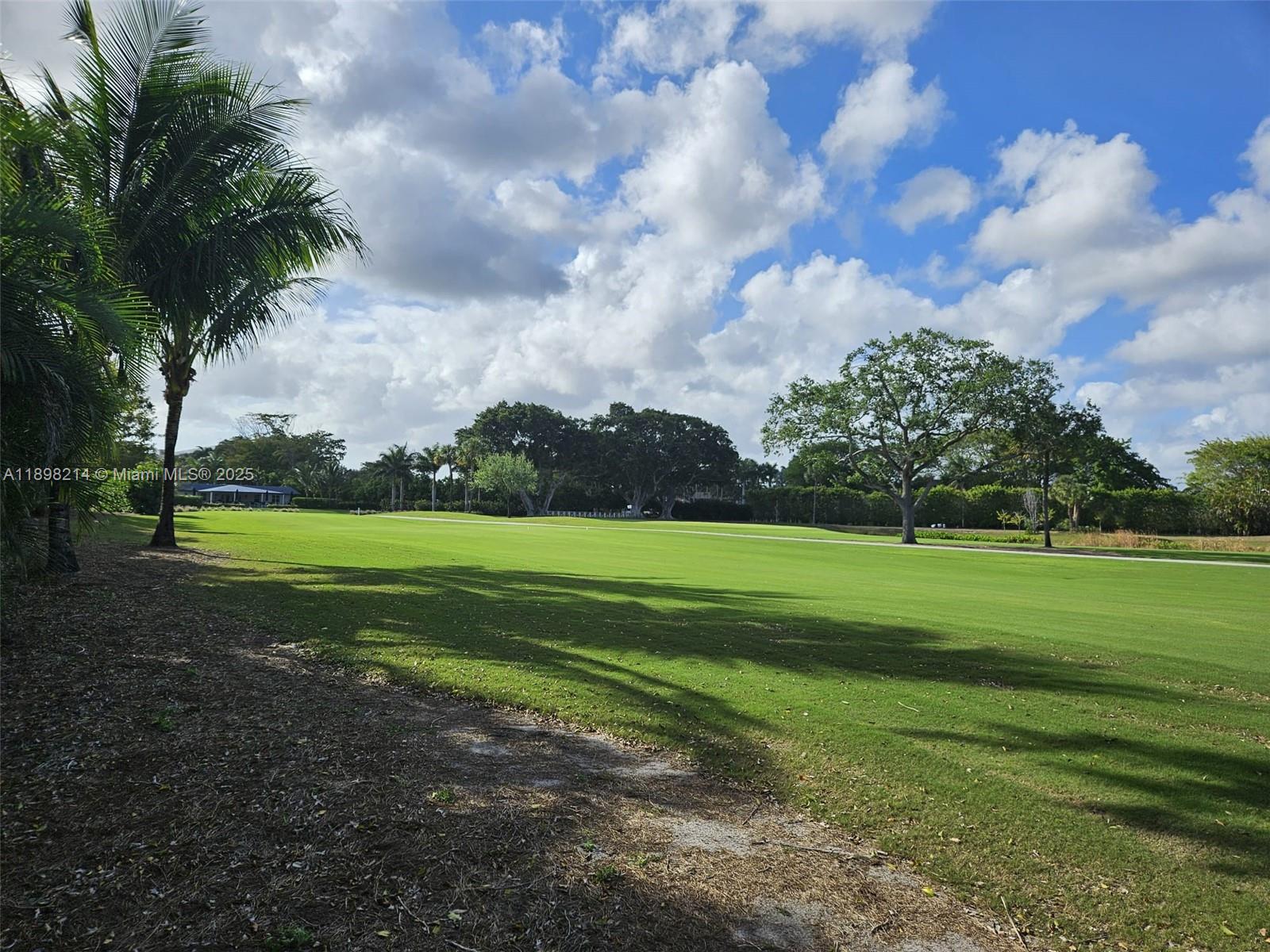 6085 Balboa Circle, Unit 403 Boca Raton, FL 33433 - Photo 31 of 32 a view of a golf course