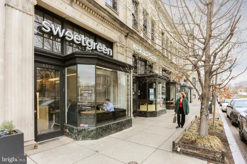 a view of path along with retail shop