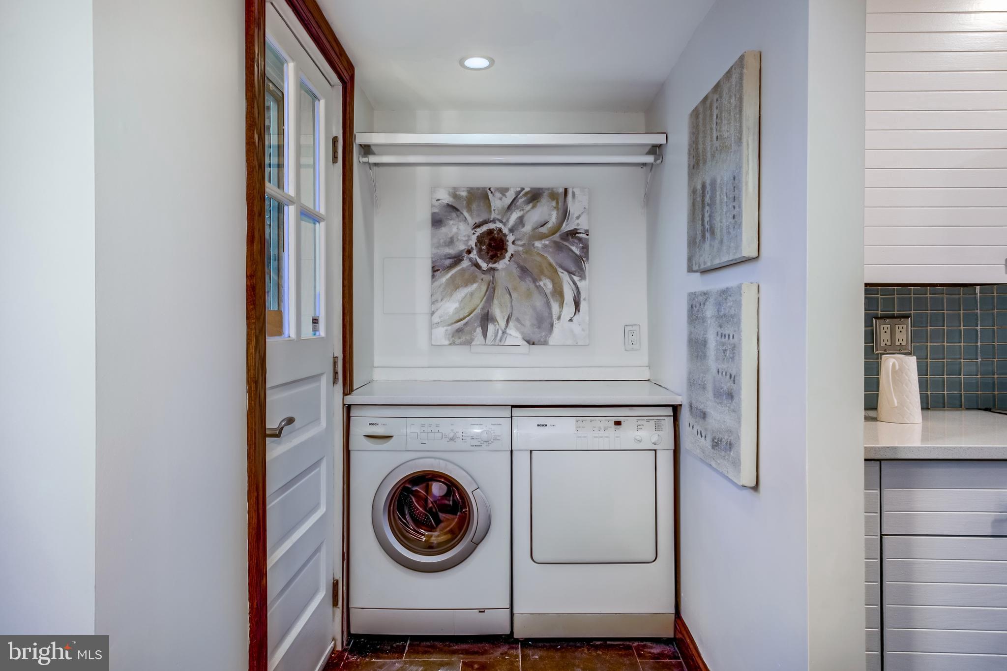 664 Acker Place Northeast Washington, DC 20002 - Photo 18 of 38 Laundry conveniently tucked away by the kitchen