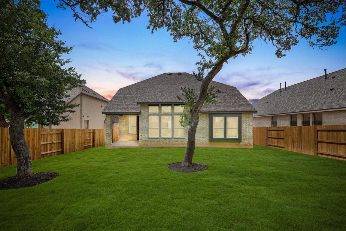 a house with garden in front of it