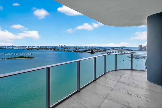 a view of a room with swimming pool and city view