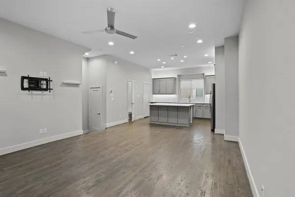 a view of kitchen with wooden floor