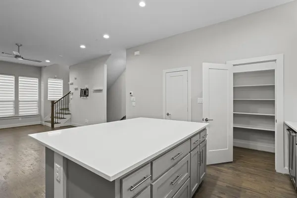 a room with a table and chairs