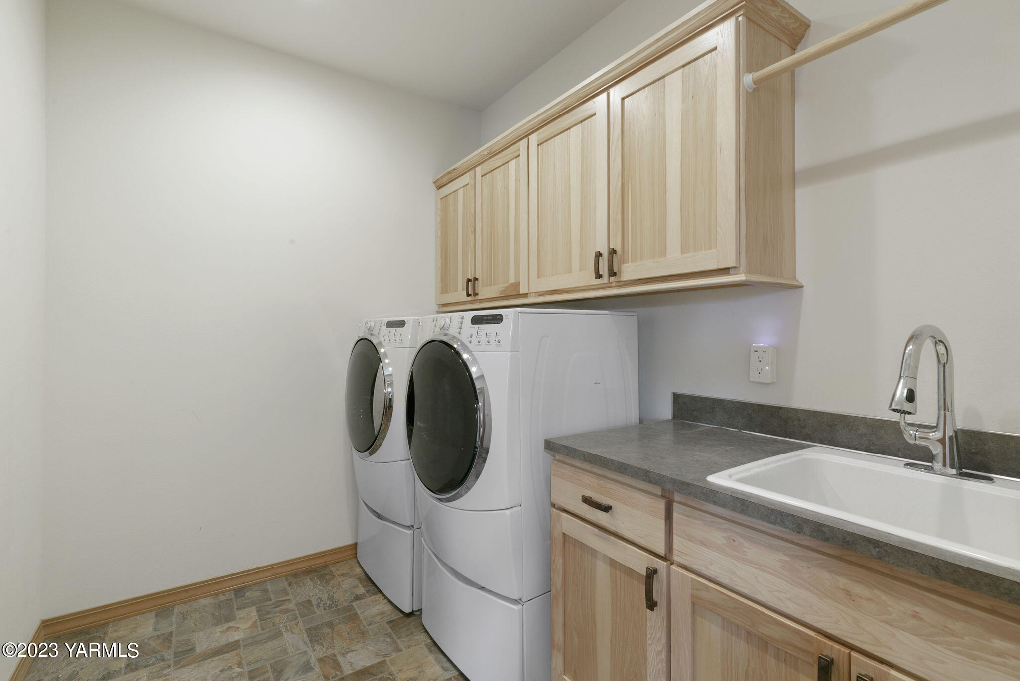 1870 Slavin Road Yakima, WA 98903 - Photo 22 of 27 a bathroom with a granite countertop sink and a vanity
