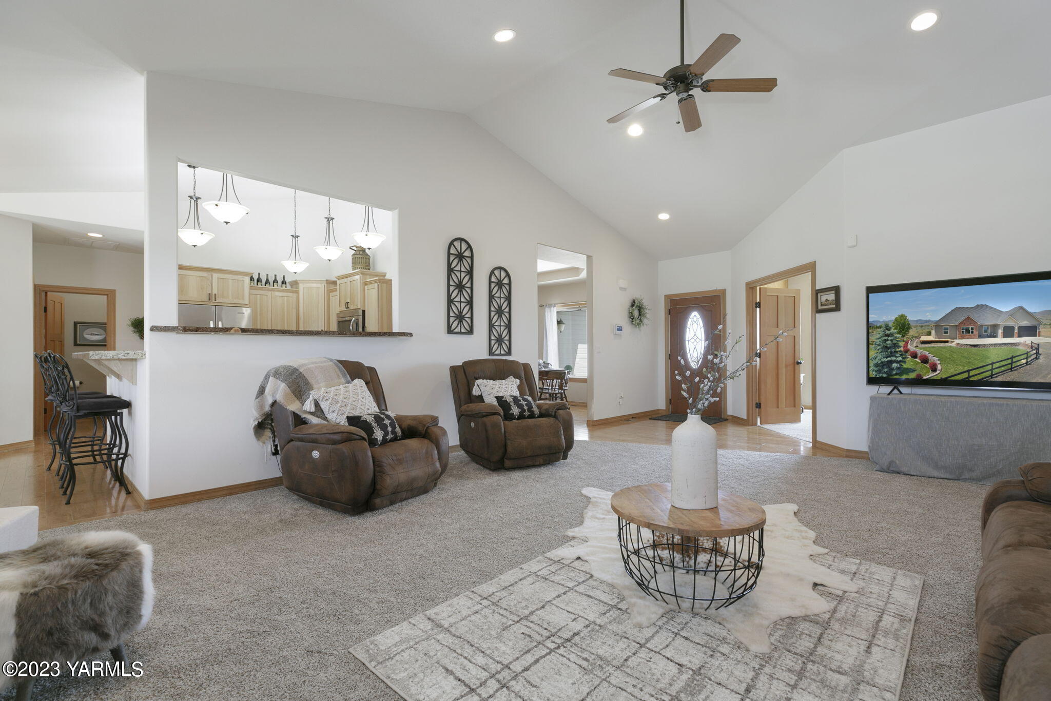 1870 Slavin Road Yakima, WA 98903 - Photo 5 of 27 a living room with furniture and a chandelier