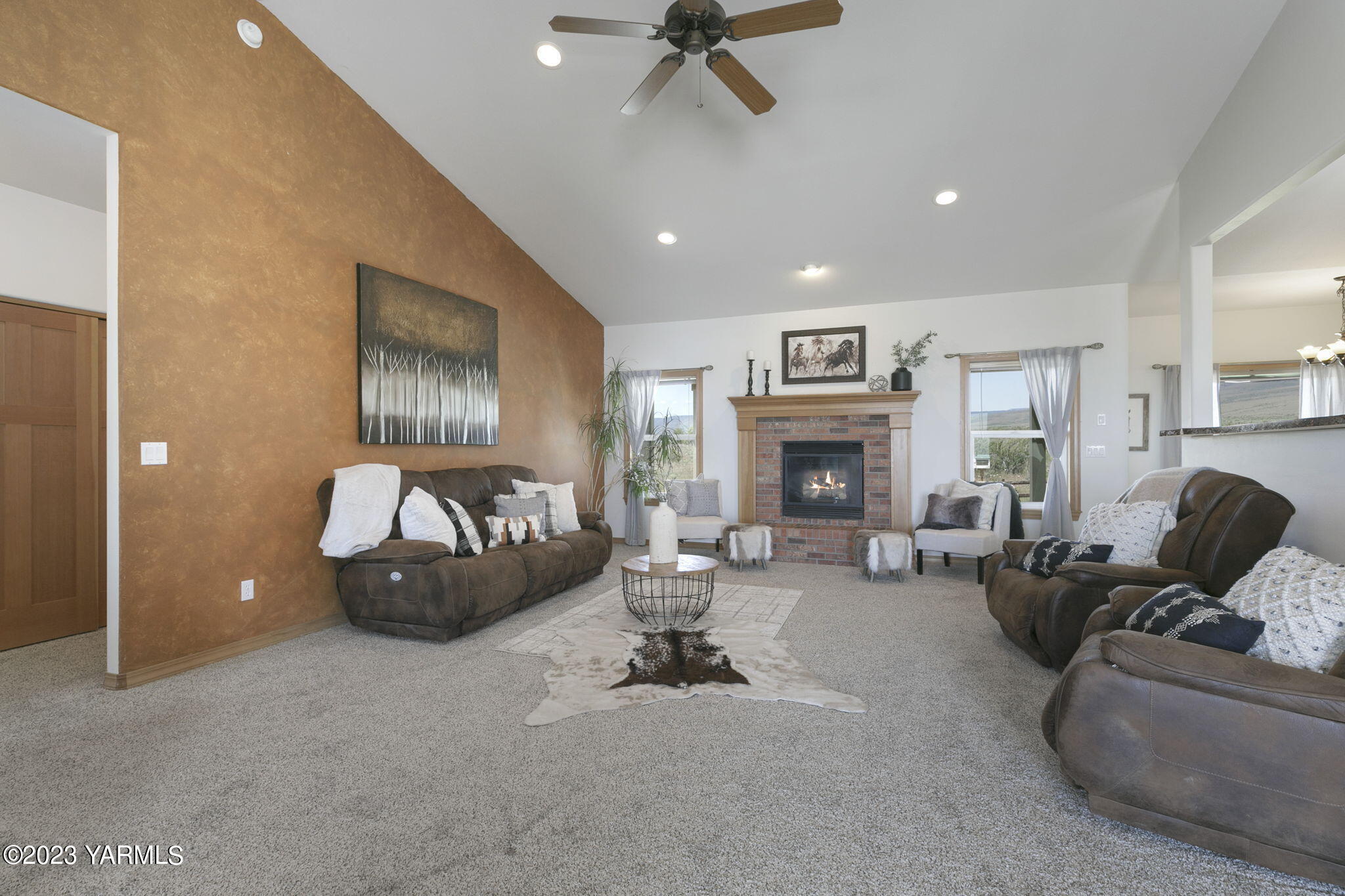 1870 Slavin Road Yakima, WA 98903 - Photo 6 of 27 a living room with furniture and a fireplace