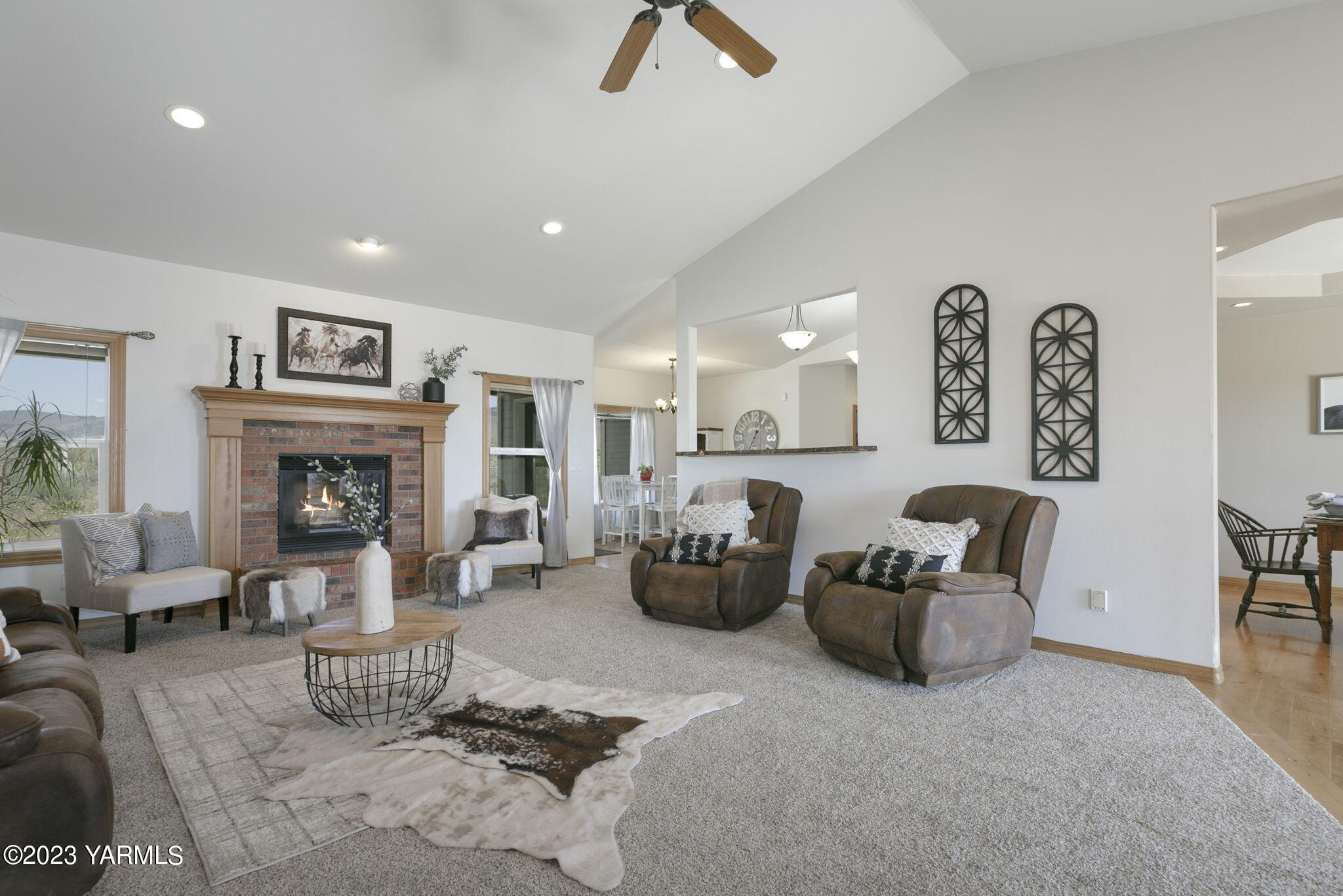 1870 Slavin Road Yakima, WA 98903 - Photo 7 of 27 a living room with furniture and a fireplace