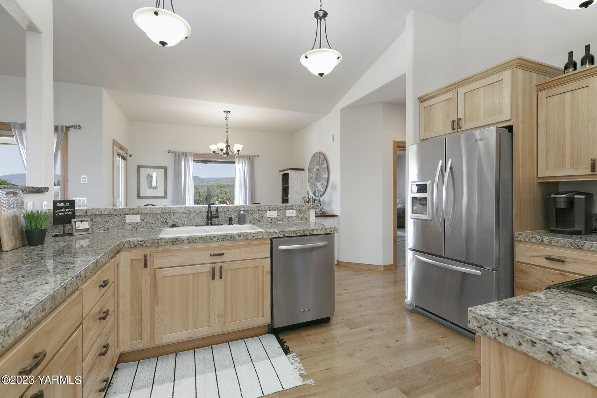 1870 Slavin Road Yakima, WA 98903 - Photo 10 of 27 a large kitchen with granite countertop a refrigerator and a sink