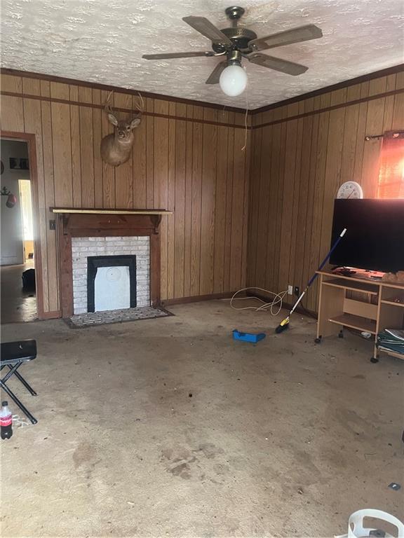 140 Green Row Calhoun, GA 30701 - Photo 2 of 8 a view of an empty room with a fireplace and a window