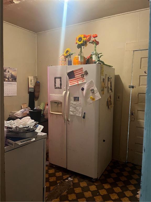 140 Green Row Calhoun, GA 30701 - Photo 3 of 8 a white refrigerator freezer sitting inside of a kitchen