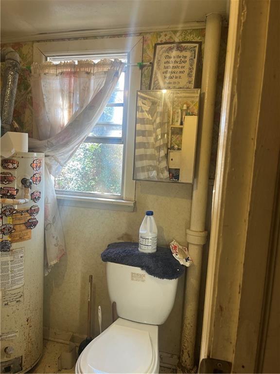 140 Green Row Calhoun, GA 30701 - Photo 6 of 8 a bathroom with a toilet and a shower