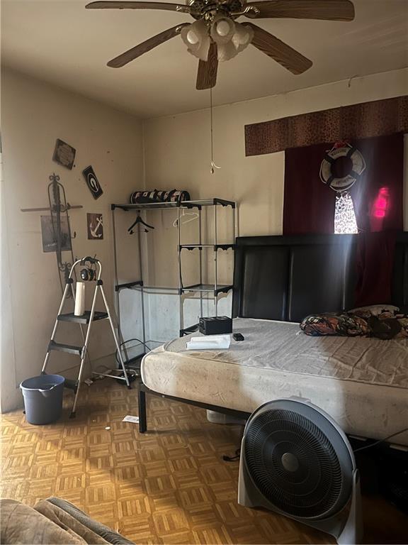 140 Green Row Calhoun, GA 30701 - Photo 8 of 8 a room with gym equipment and a chandelier