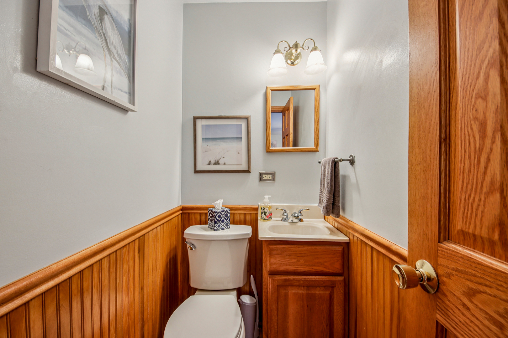 1618 Pine Trail Sycamore, IL 60178 - Photo 17 of 33 a bathroom with a toilet sink and mirror