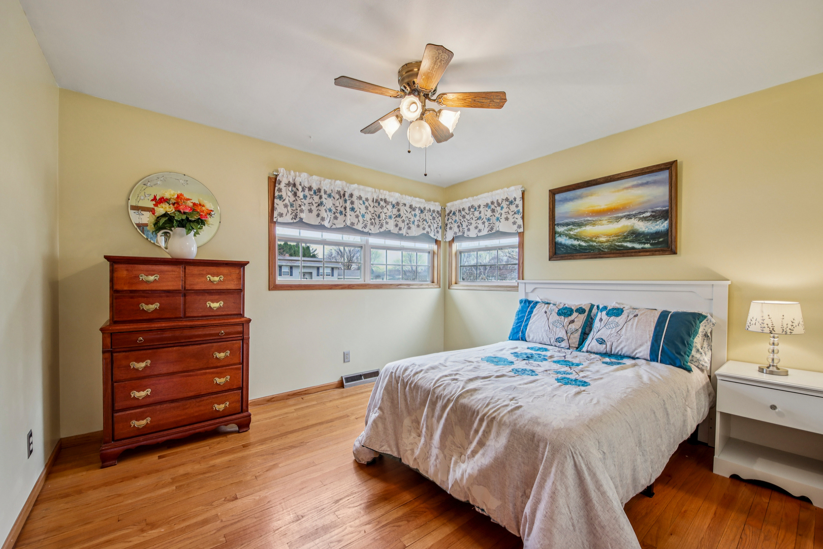 1618 Pine Trail Sycamore, IL 60178 - Photo 22 of 33 a bedroom with a bed and a chandelier