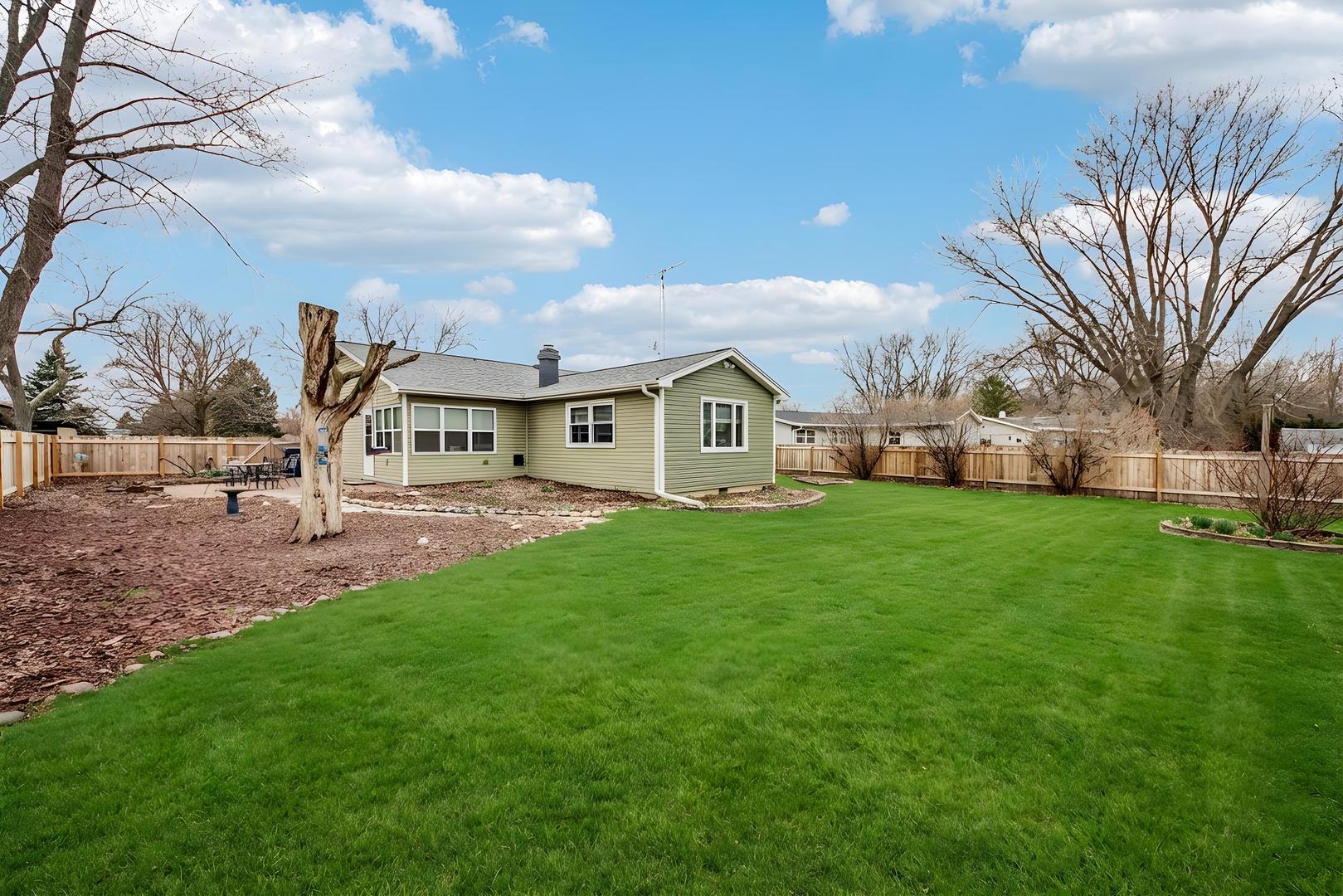 1618 Pine Trail Sycamore, IL 60178 - Photo 28 of 33 a front view of a house with garden