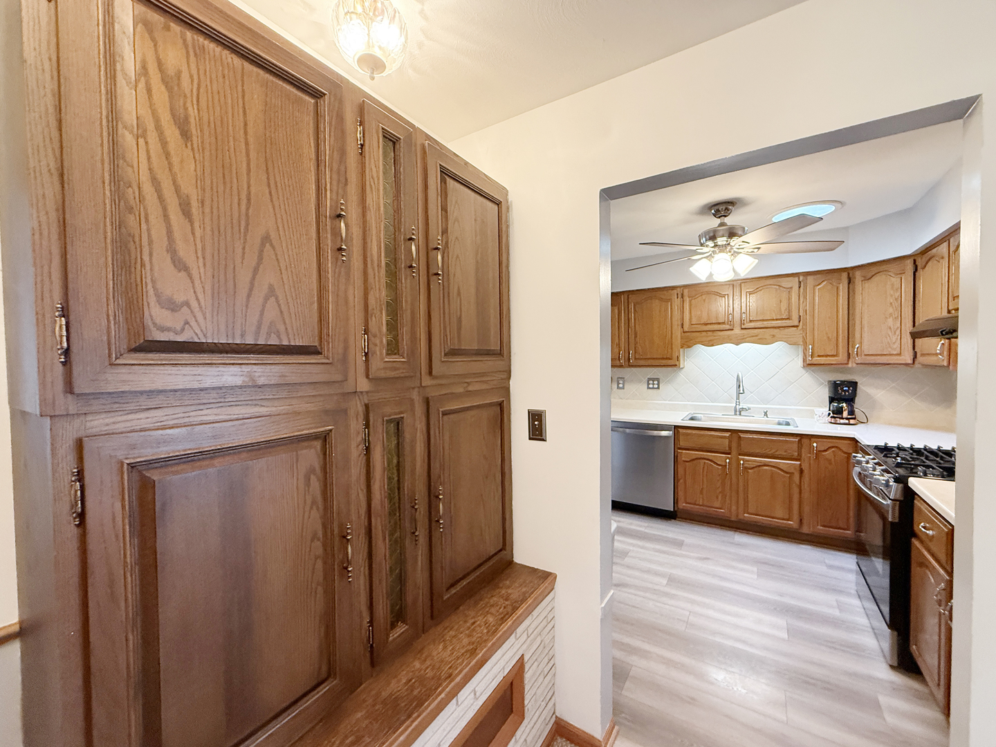 1618 Pine Trail Sycamore, IL 60178 - Photo 6 of 33 a kitchen with stainless steel appliances granite countertop a refrigerator and cabinets