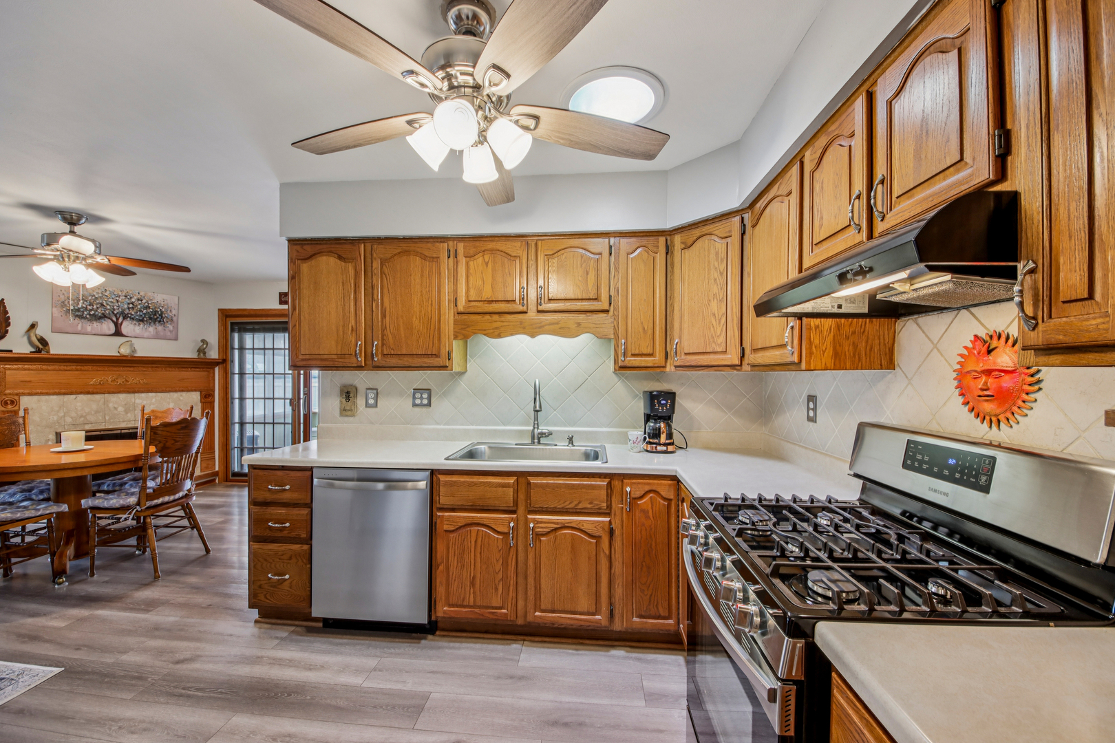 1618 Pine Trail Sycamore, IL 60178 - Photo 8 of 33 a kitchen with stainless steel appliances granite countertop a stove and a sink