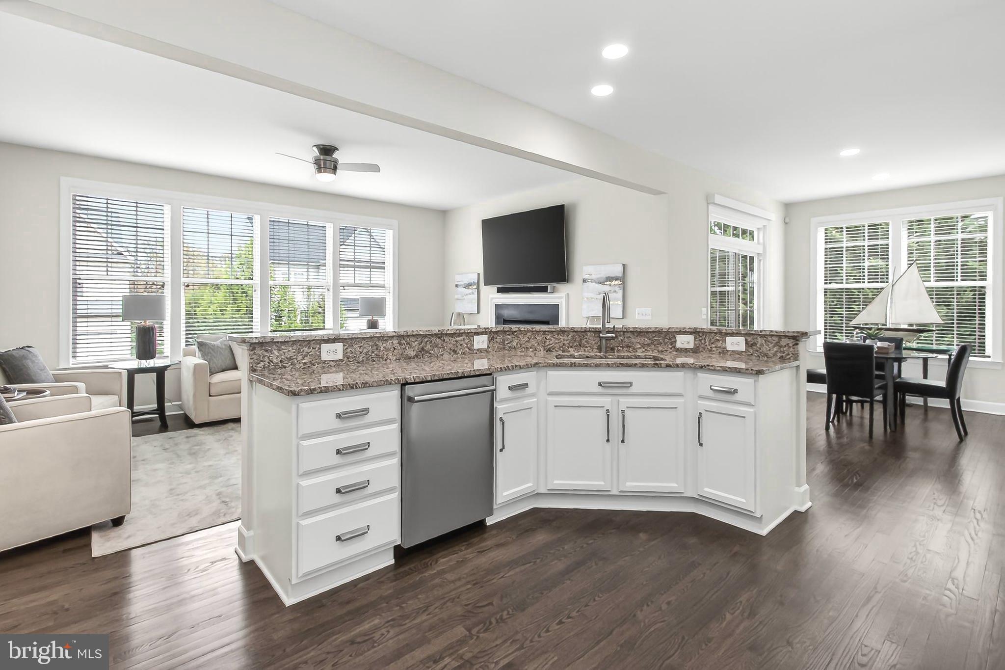 41004 Indigo Place Leesburg, VA 20175 - Photo 18 of 64 Panoramic Views into the Great Room and Dining