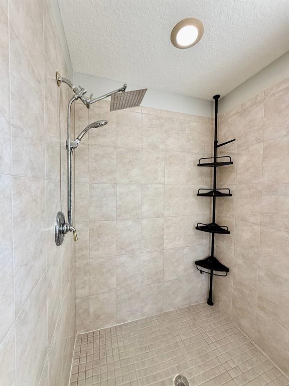 6545 Simone Shores Circle Apollo Beach, FL 33572 - Photo 23 of 46 a bathroom with a shower
