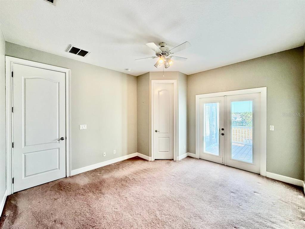 6545 Simone Shores Circle Apollo Beach, FL 33572 - Photo 25 of 46 a view of empty room with fan