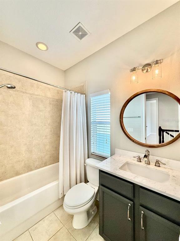 6545 Simone Shores Circle Apollo Beach, FL 33572 - Photo 28 of 46 a bathroom with a sink and a mirror