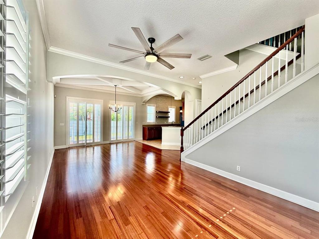 6545 Simone Shores Circle Apollo Beach, FL 33572 - Photo 3 of 46 a view of interior space with wooden floor and white walls