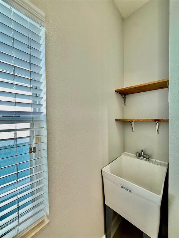 6545 Simone Shores Circle Apollo Beach, FL 33572 - Photo 40 of 46 a bathroom with a sink and a vanity
