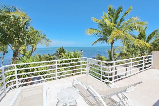 a kitchen with stainless steel appliances kitchen island granite countertop a sink and cabinets